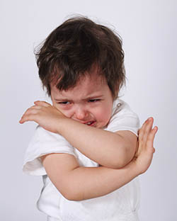 Little boy crying emotional tears